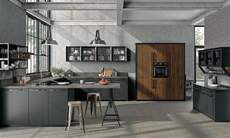 Arrital is a brand that operates in the kitchen design sector and has always represented the values of contemporary design, made in italy, research and the ability to design innovative solutions and quality products. Cucina Oltre Bridge di lube in stile industriale