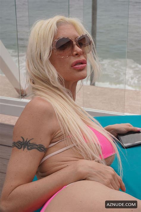 Angelique Frenchy Morgan Wears A Pink Bikini While Getting Some Sun