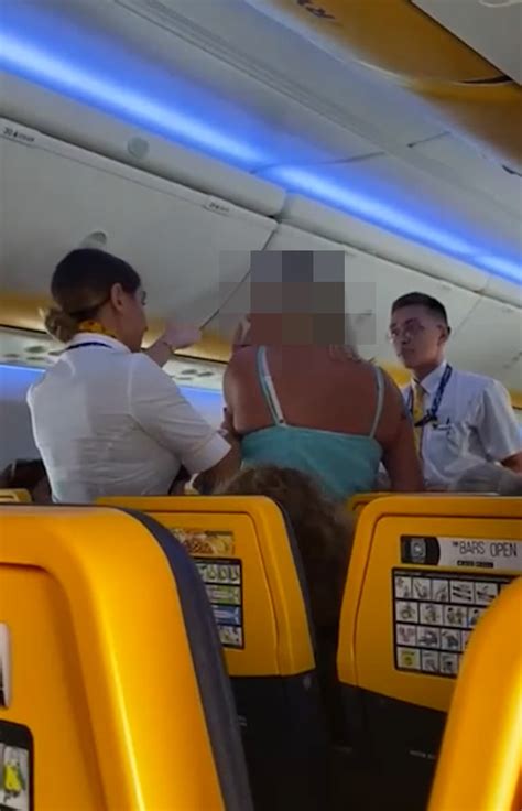 Watch As Drunk Woman Is Escorted Off Scots Flight After Abusing Her Partner And Ryanair