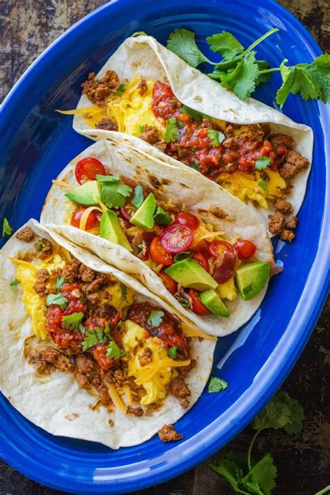 Easy Breakfast Tacos With The Fluffiest Eggs Chorizo Cheese And Your Favorite Toppings You
