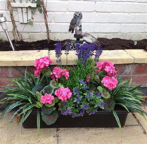 Available in a wide range of vibrant colours. Twit twoo - artificial mixed flower window box in ...