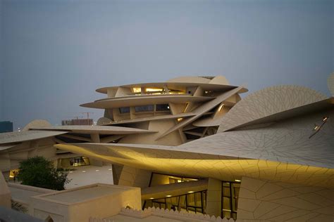 National Museum Of Qatar Exterior View At Dusk Archnet