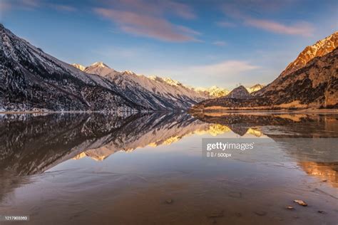 Snowcapped Mountains Reflected In Ranwu Lake Baxoi County Chamdo