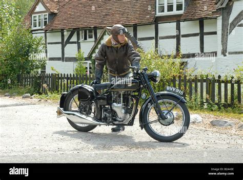 Classic British Velocette Motorbike With Rider In Period Clothing Stock
