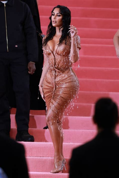 so camp kim kardashian redefining her sex appeal in a dripping dress who didn t follow the