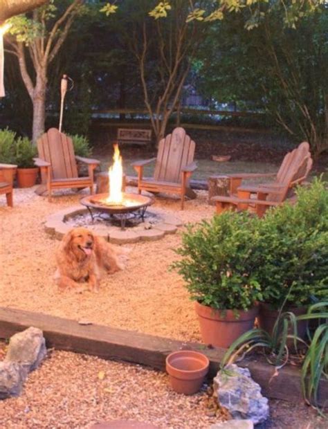 Unvelievably cheap with a $25 price tag, diy blogger karen shows off all the right stuff by melissa from inspired room enhanced her new backyard fire pit using a 44 allen diy ring and a batch of retaining wall blocks from lowe's. Frame in area in backyard with wood. Put down mulch. Add ...
