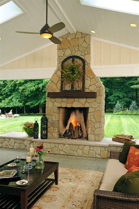 9 Outdoor Fireplace Ideas Town And Country Living Patio Fireplace