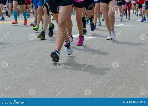 Marathon Running Race Many Runners Feet On Road Sport Fitness And