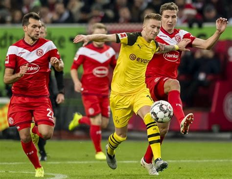 Football Extras Dortmund stunned PSG progress in Cup  Rediff Sports