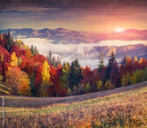 Colorful Autumn Sunrise In The Mountains Stock Photo And Royalty