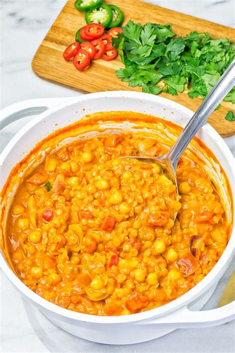 Turn up the heat, then add the stock, tomatoes and chickpeas, plus a good grind of black pepper. Moroccan Chickpea Lentil Soup (Harira) | Recipe | Vegan lentil recipes, Lentil soup, Red lentil ...