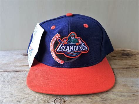 Not sure about the teal (it's the 90's we get it). New York ISLANDERS Vintage 90s Deadstock Snapback Hat Fisherman Logo The Game Baseball Cap ...