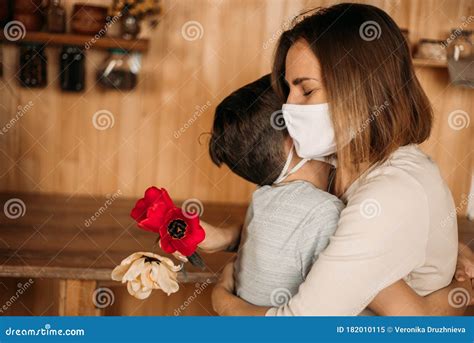 Masked Mom Hugs Masked Son Happy Family In Quarantine Stock Image Image Of Covid Love