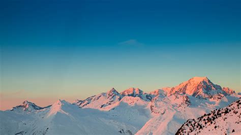 Download 1600x900 Wallpaper Sunset Horizon Clean Sky Glacier