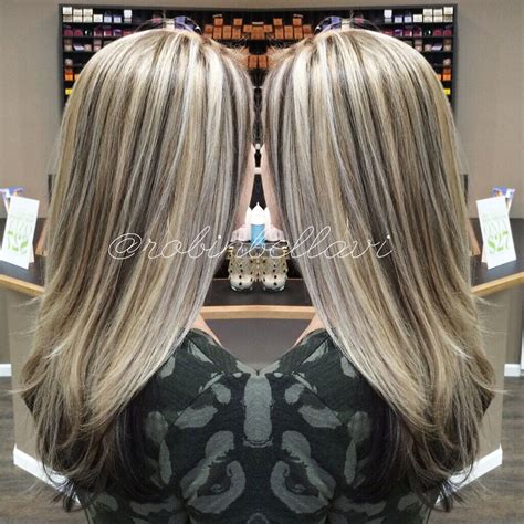 Never thought of having funky red highlights in your blonde hair! Icy ashy blonde with dark brown lowlights. #longhair # ...