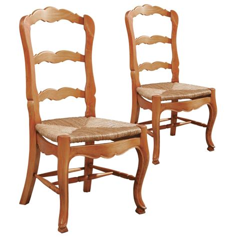 Some country kitchen chairs can be folded and stored, a convenient option if you have space to a metal tub chair in a burnished, unpainted steel adds a rustic touch to a country kitchen, while being. French Country Ladderback Side Chair - Set of 2 | French ...