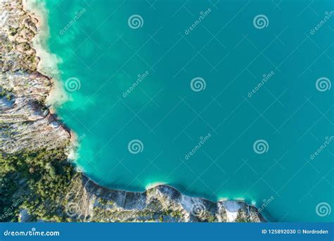 The Shores Of The Mountain Lake The Blue Water In The Lake Aerial