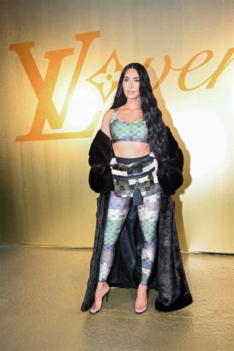 kim kardashian gets sporty for pharrell s louis vuitton debut show
