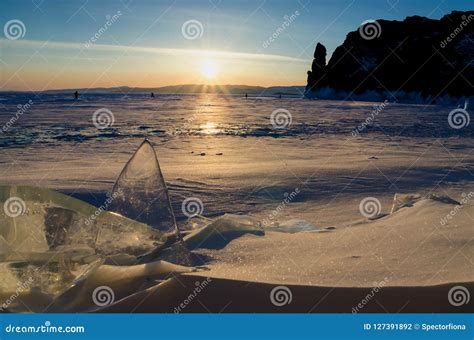 The Frozen Lake Baikal Winter Landscape With Ice And Snow Near The