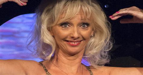 Debbie Mcgee 59 Reveals Entire Chest In Catsuit Slashed To Waist