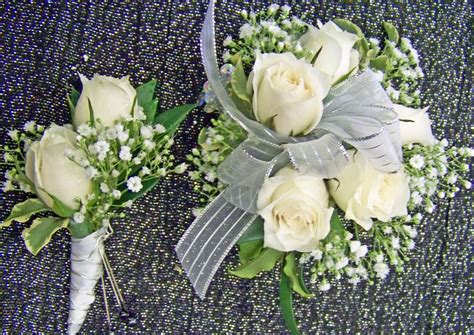 Wrist Corsage Of White Spray Roses And Babies Breath With Matching