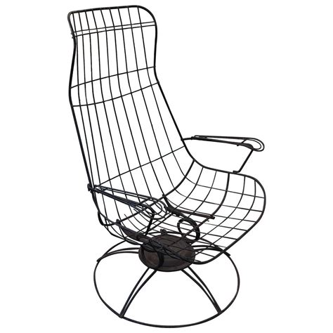 The durable yet elegant metal frame has been spot welding in just the right place for extra added durability and aesthetics. Homecrest Metal Wire High Backed Lounge Chair at 1stdibs