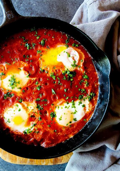 Shakshuka Eggs Poached In Tomato Sauce Vertical By The Whole Cook