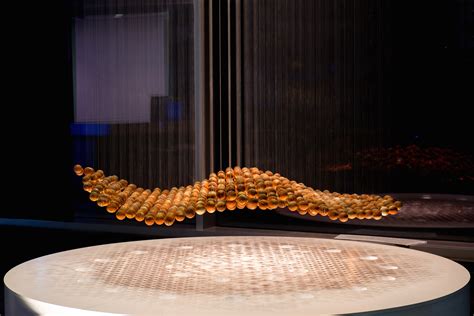 A Kinetic Sculpture Arranges 804 Orbs From Order To Chaos