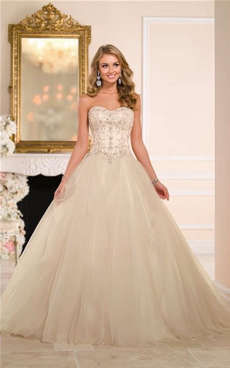 To create such a dramatic look, many ball gown wedding dresses use layers of tulle or crinolines, a type of stiff underskirt. Ball Gown Strapless Drop Waist Champagne Colored Satin ...