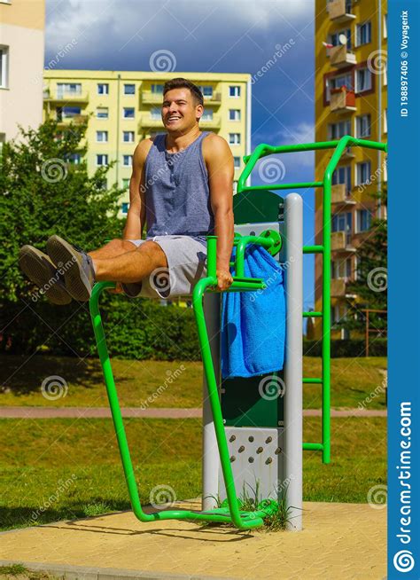 Man Doing Sit Ups In Outdoor Gym Stock Photo Image Of Outdoor Adult