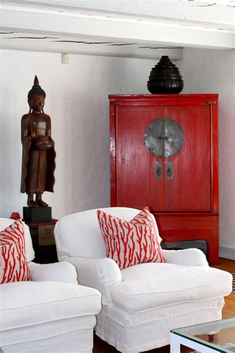 Looking for oriental decor sites? Red Wedding Cabinet -- like the red accent. Would work ...