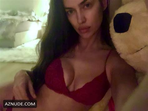 irina shayk shows off her curves in the red underwear by the italian lingerie brand aznude