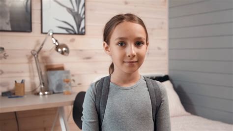 Portrait Of Adorable 8 Year Old Girl In Room Stock Footage Sbv