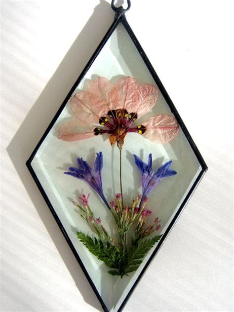 Wedding cards, greeting cards, jewellery and even iphone cases to name a few becomes all the more special with those carefully and beautifully preserved and pressed blossoms. Stained Glass pressed flower bevel suncatcher | Flores ...