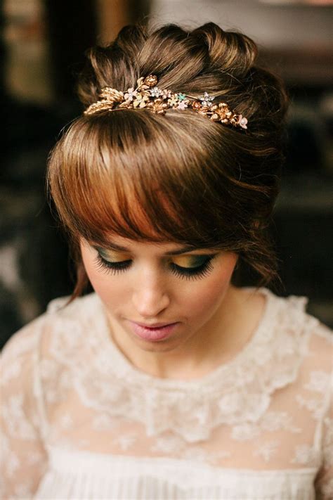 A half updo with long sleek hair down and bangs can fit both a modern or a boho bride. 15 Gorgeous Bridal Hair with Bangs - Pretty Designs