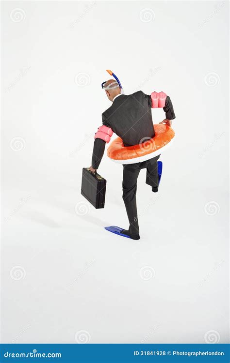 Businessman In Swimming Gear With Briefcase Royalty Free Stock Photos
