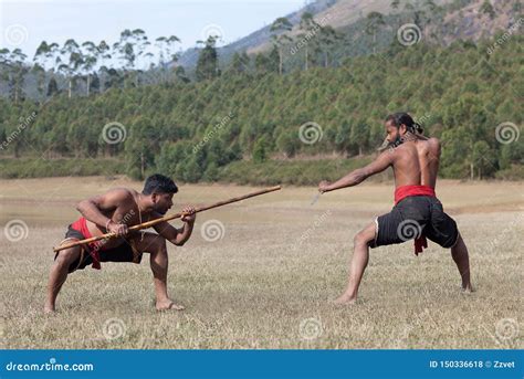 Indian Fighters Performing Weapon Combat During Kalaripayattu Marital