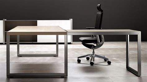 This table provides you with plenty of desktop surface. Oikos L-Shaped Desk with Metal Leg