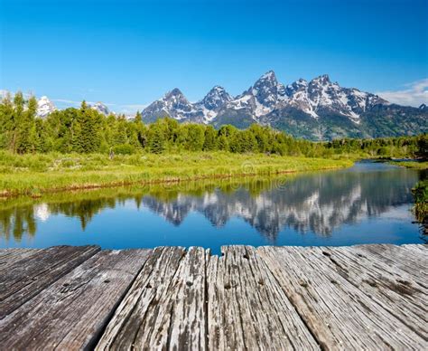 Mountains In Grand Teton National Park With Reflection In Snake River