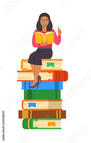 Young Black Woman Teacher Reads Open Book Sitting On Stack Of Giant