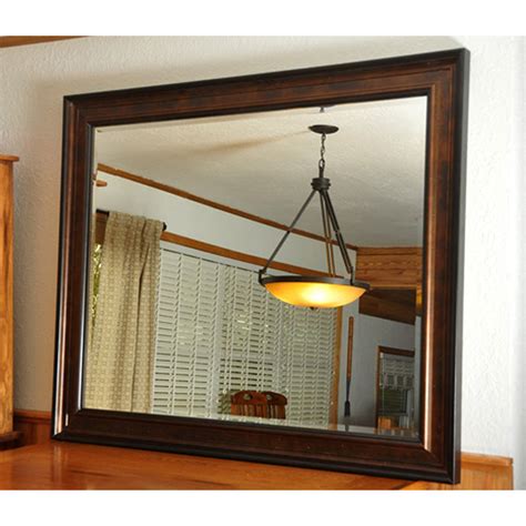 The frame features plastic construction for durability and a high gloss white finish. Wall Mirror - Bronze Finished Frame, Black Trim, Beveled ...