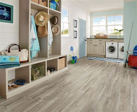 Cheap mudroom storage ideas and designs. Love the taupe flooring in this mudroom | Luxury Vinyl ...