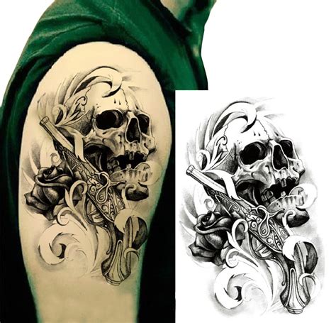 Guns and roses, skulls, machine guns and many more. Temporary tattoos large skull gun shoulder arm fake ...