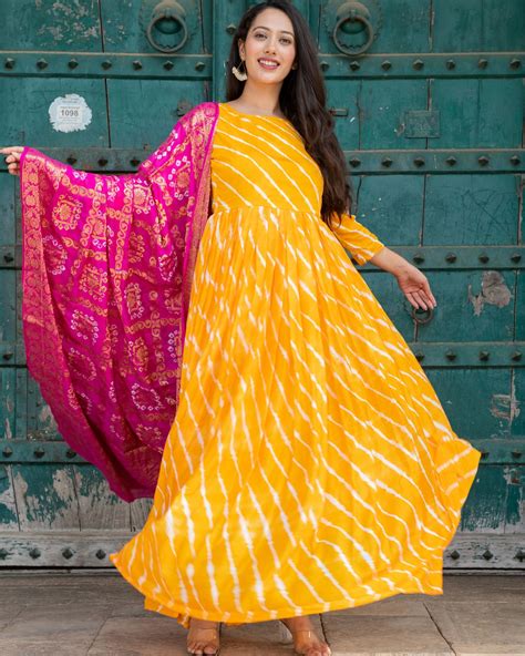 Yellow Leheriya Upada Silk Dress With Pink Banarsi Silk Dupatta Set Of Two By Chokhi Bandhani
