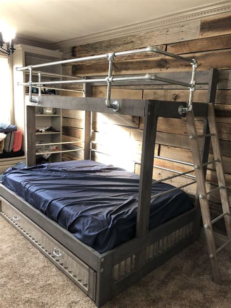 The safety railing extends well above a standard. 40+ DIY Loft Bed Ideas Built with Industrial Pipe ...