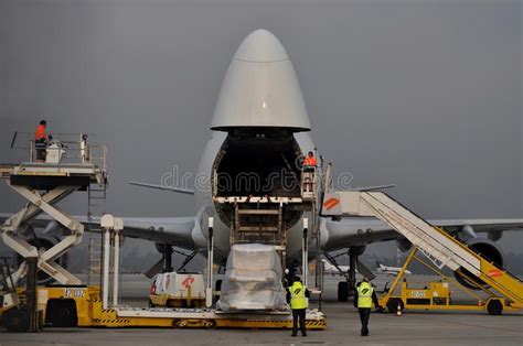 Cargo Plane Loading Boeing 747 Freighter With Cargo Being Loaded