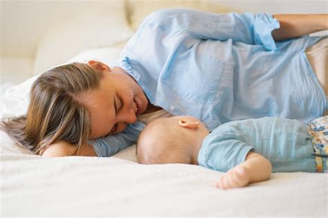 Premium Photo Newborn Baby Boy Sucking Milk From Mothers Breast