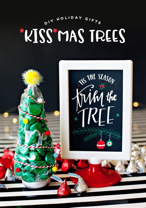 A paper bag recycling bin. KISS-mas Tree Holiday Gifts + Free Printable // Hostess ...