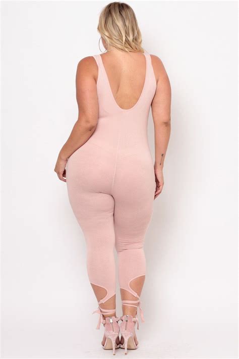 this plus size stretch knit jumpsuit features a sleeveless design a low round neckline with