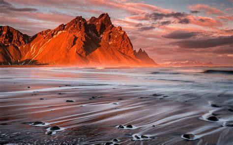 Sea Coast Beach Rocky Mountains Sky With Red Clouds Stokksnes